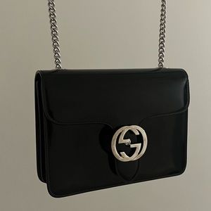 Black leather Gucci bag womens with silver buckle